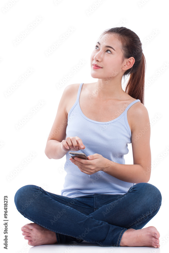 Happy woman using smartphone with looking up. Happy woman using smartphone with looking up.