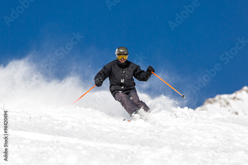 Tablou pe pânză Skier skiing on ski slope