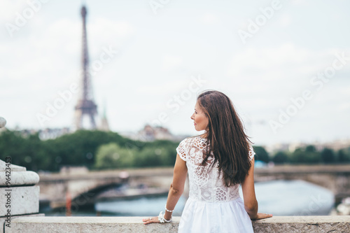 love and romance, woman on honeymoon near Eiffel Tower in Paris, heart for Valentines day © xan844