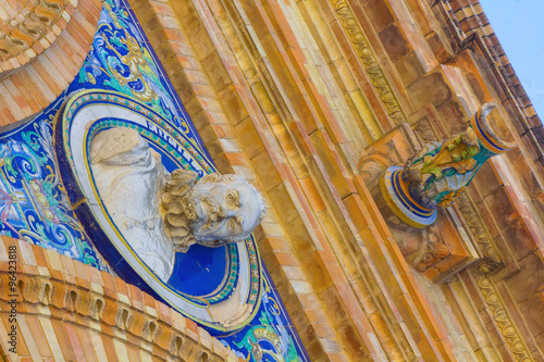 details of the statues of the famous square of Spain in Seville