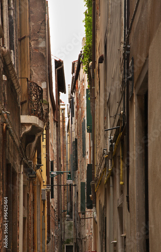 Narrow street in Venice. Veneto. Italy