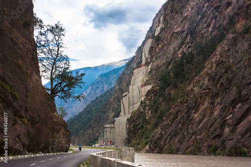 High mountain road adn river in Himalayas