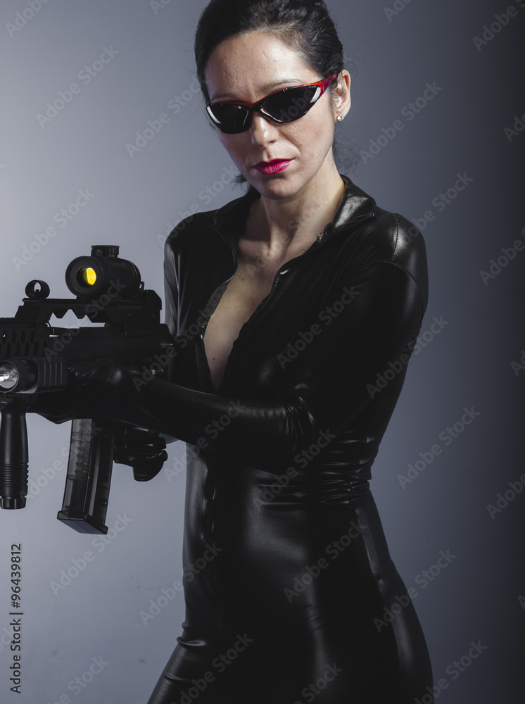 Control, beautiful brunette with black suit, armed and dangerous Control, beautiful brunette with black suit, armed and dangerous