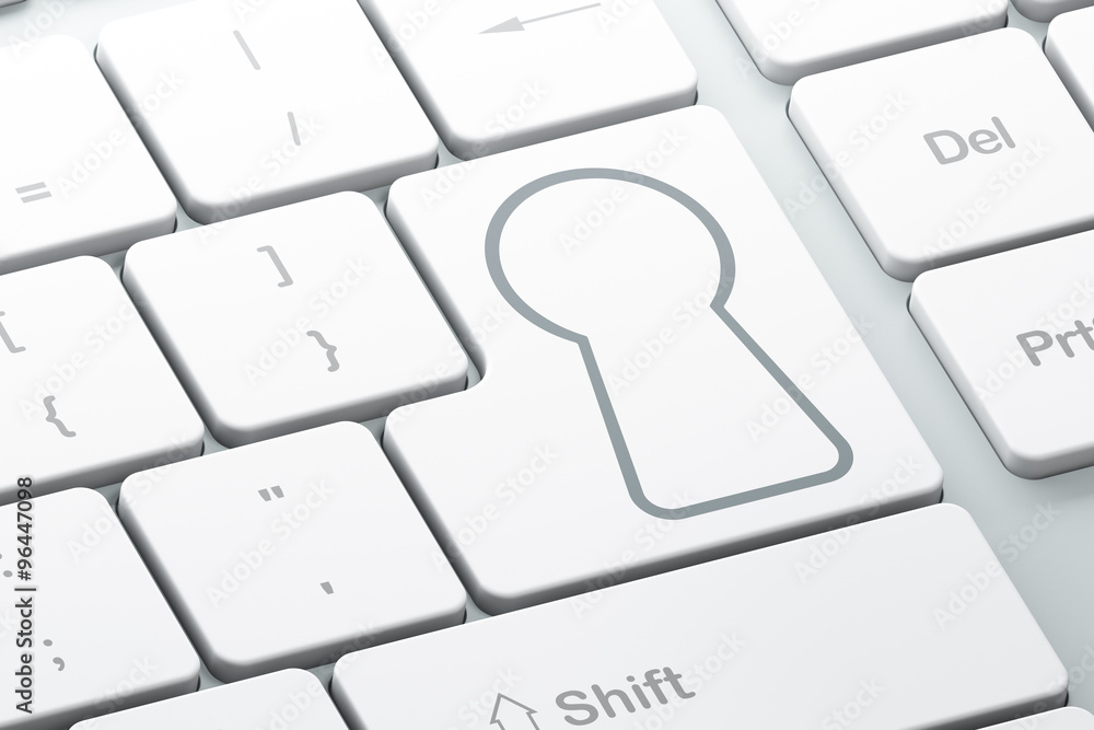Security concept: Keyhole on computer keyboard background Security concept: Keyhole on computer keyboard background