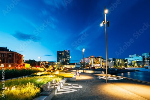 Photography Night view of the city's waterfront, illuminated lanterns in the