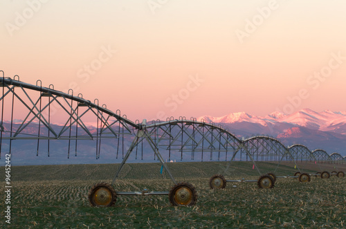 Pivot Irrigation System with Mountain Range in background