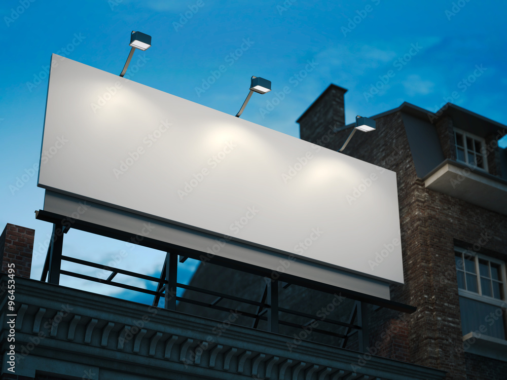 Blank billboard standing on classic building in the night Blank billboard standing on classic building in the night