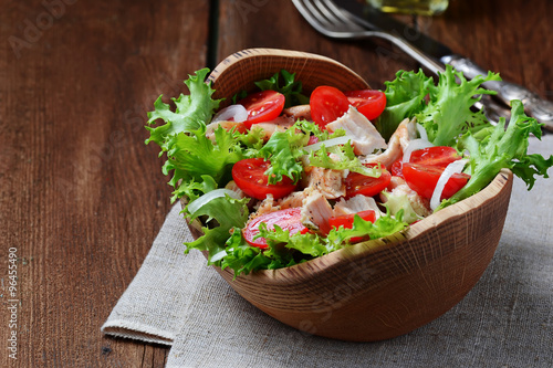 Salad with chicken, tomato cherry and onion