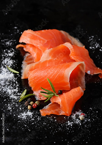 Quadro su tela Salted salmon with rosemary and pepper