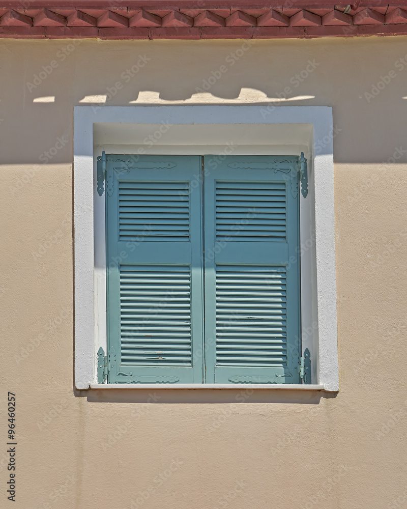 Athens Greece, green shutters window in Plaka old neighborhood