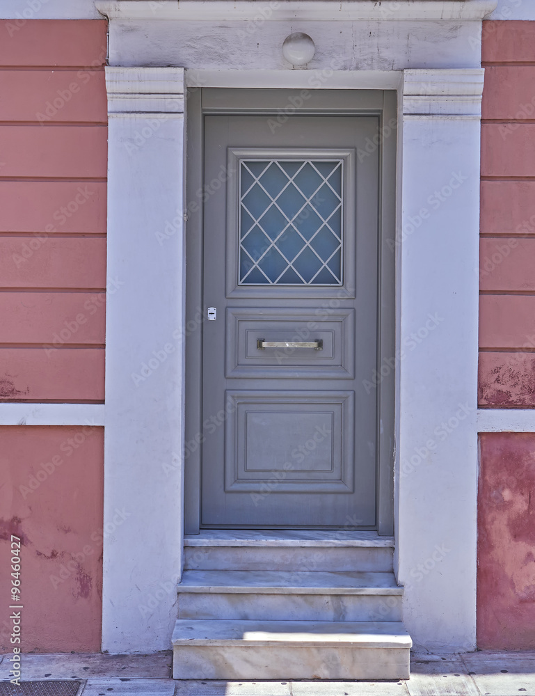 Fototapeta premium Athens Greece, house grey door in Plaka old neighborhood under acropolis