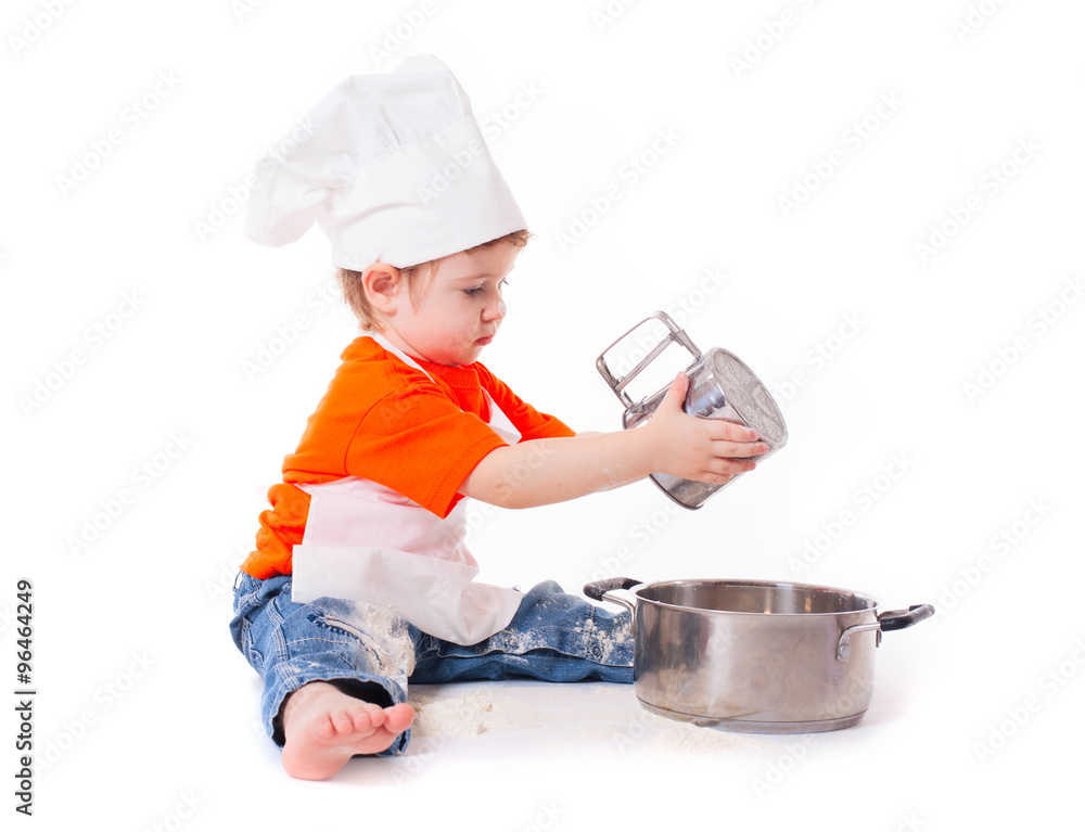 baby chef sifting flour isolated on white background baby chef sifting flour isolated on white background