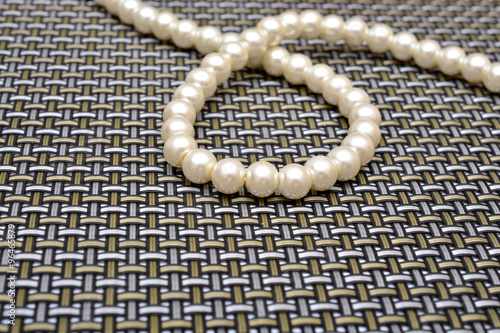 Pearl silver on pattern background.