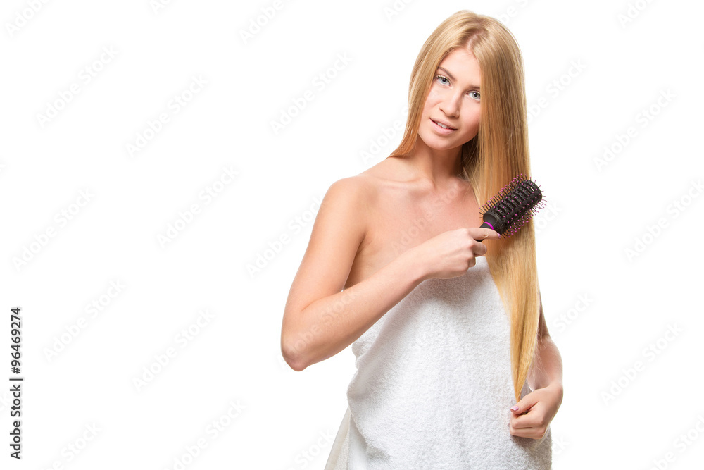 Young attractive blond woman with blue eyes in a towel Young attractive blond woman with blue eyes in a towel