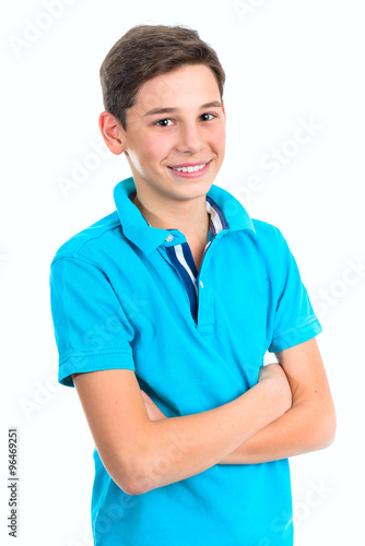 Portrait of handsome teenager on a light background