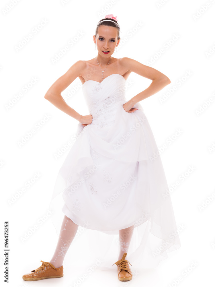 Wedding. Running bride funny woman in sport shoes