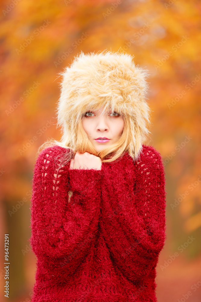 Pretty fashion woman in winter hat feeling cold. Pretty fashion woman in winter hat feeling cold.