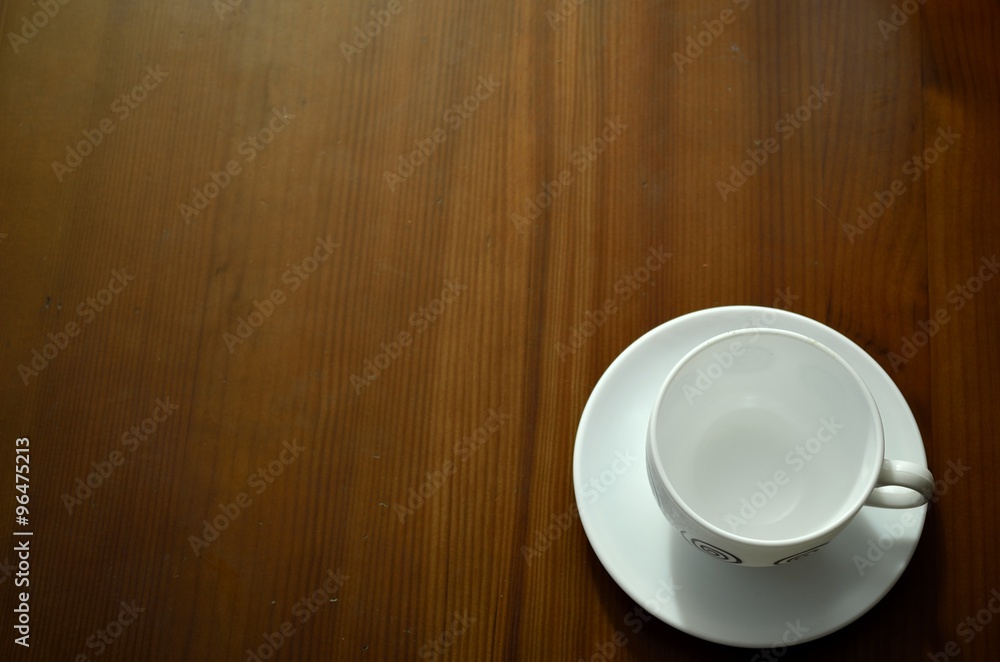 cup of coffee on wood table cup of coffee on wood table