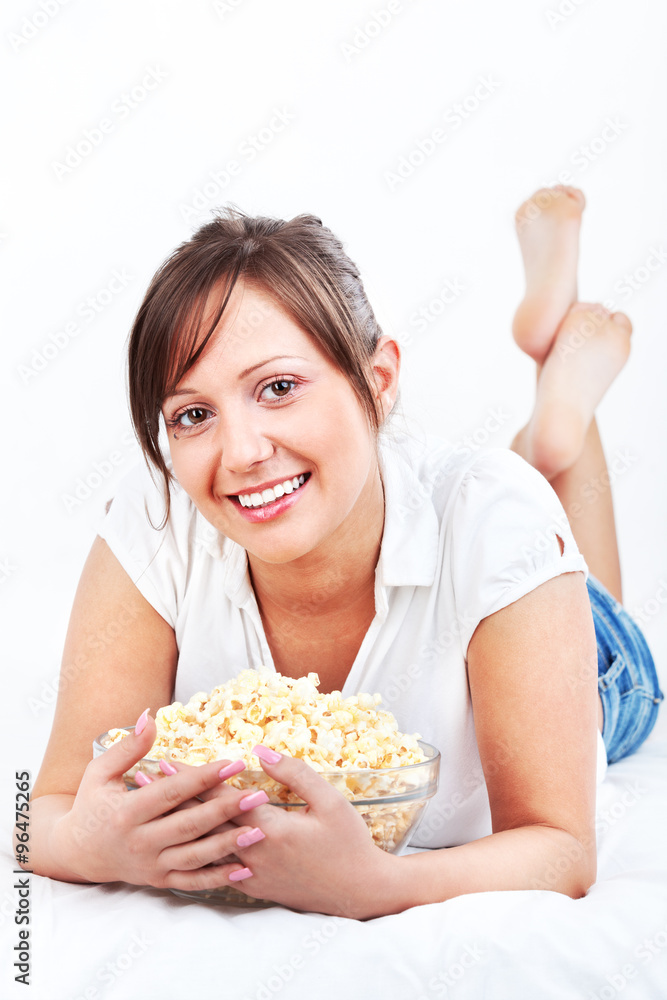 Young woman eating popcorn Young woman eating popcorn