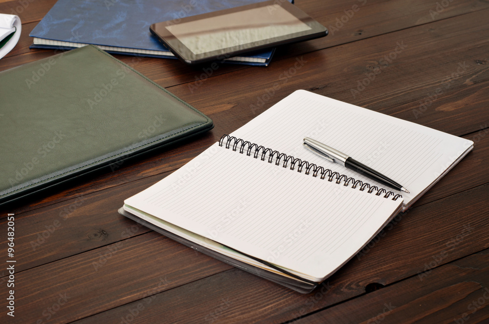 Open notebook on the office desk Open notebook on the office desk