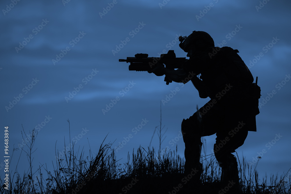 Silhouette of soldier with rifle.. Silhouette of soldier with rifle..