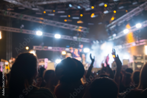 Blurred background : Bokeh lighting in outdoor concert with cheering audience © moomusician
