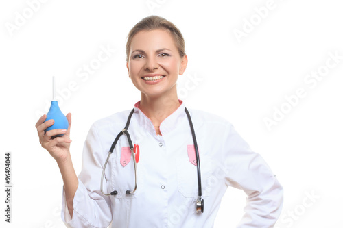 Foto Happy female doctor holding enema