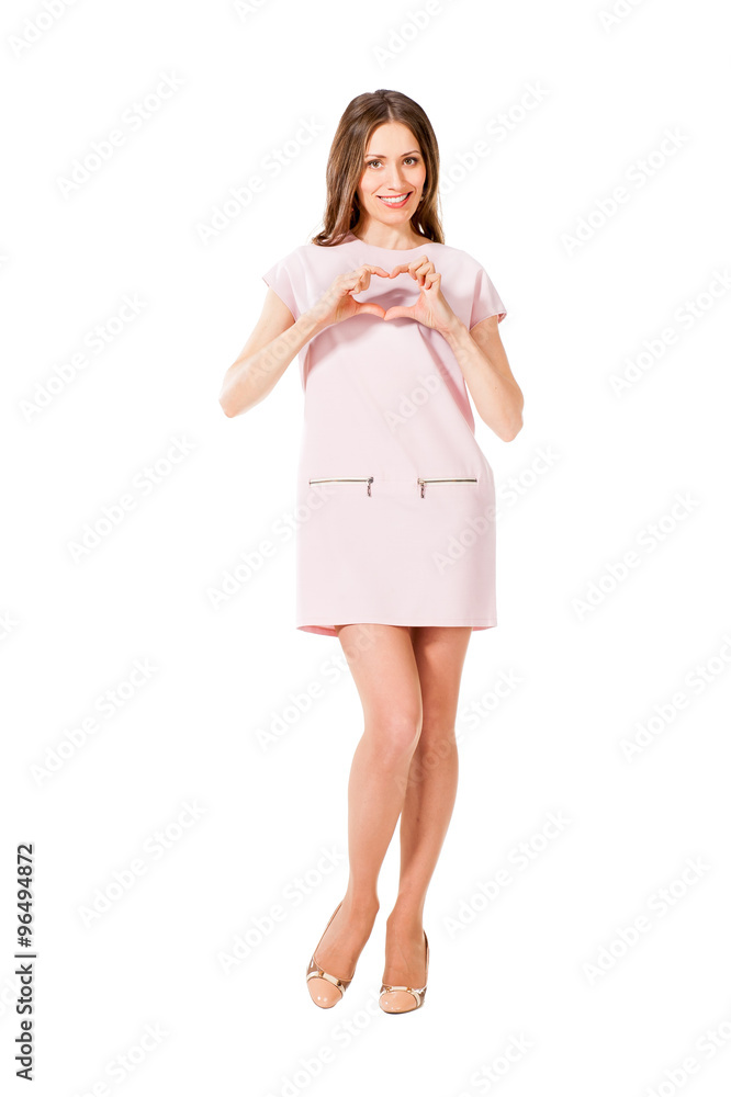 Young slim pretty woman in pink dress posing Young slim pretty woman in pink dress posing
