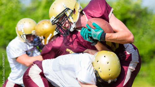 Attack at American Football Game being blocked photo