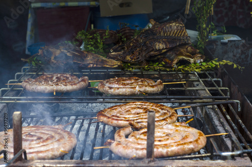 Typical Sardinian food. Sausages roast, pieces of meat roast in the barbecue