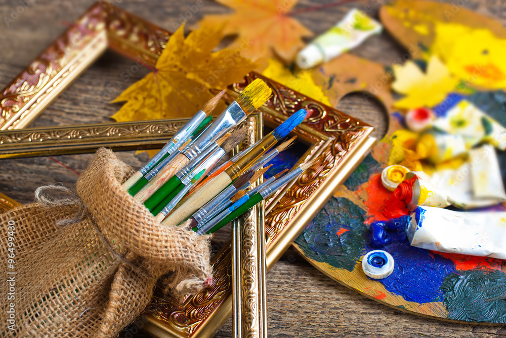 Fototapeta premium Paints and brushes