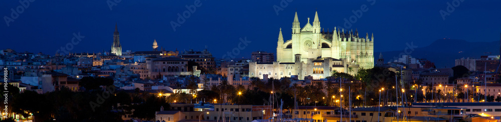 Widescreen of Palma de Mallorca and Cathedral by night.