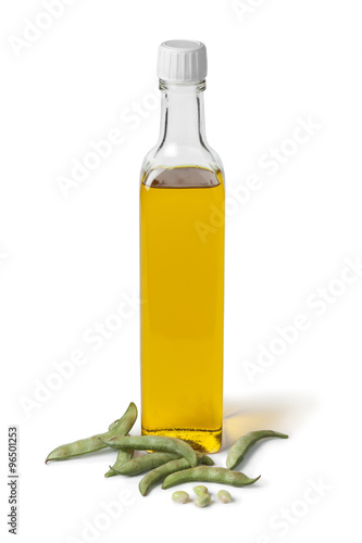 Bottle of soybean oil and fresh soy beans