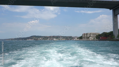 Passing under the Bosphorus Bridge in Istanbul Turkey. Shot from a touristic boat. Fast forwarded.
