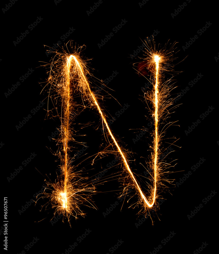 Sparkler firework light alphabet N (Capital Letters) at night Sparkler firework light alphabet N (Capital Letters) at night
