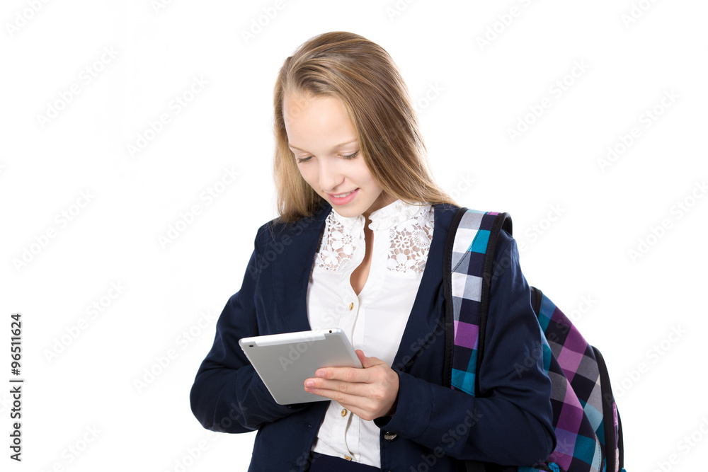 Fototapeta premium Schoolgirl using tablet