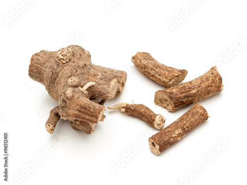 Macro closeup of a Organic Ganthoda or Long pepper Roots (Piper longum) isolated on white background. photo