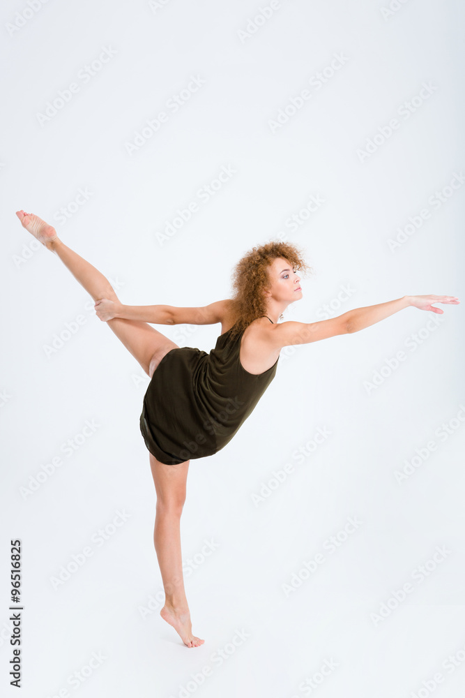 Female ballerina with curly hair dancing Female ballerina with curly hair dancing