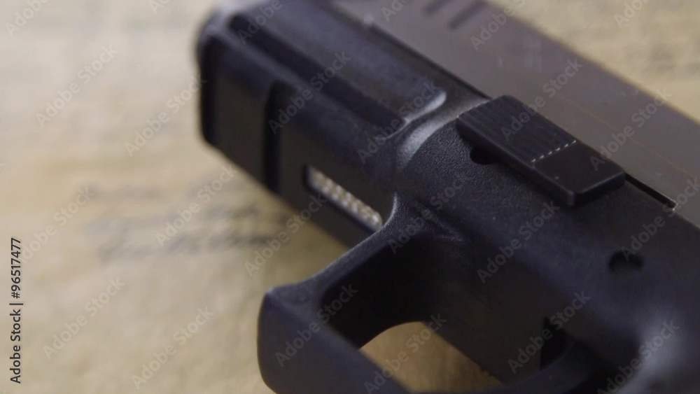 US Constitution Bill of Rights with hand gun - History of the Second Amendment US Constitution Bill of Rights with hand gun - History of the Second Amendment