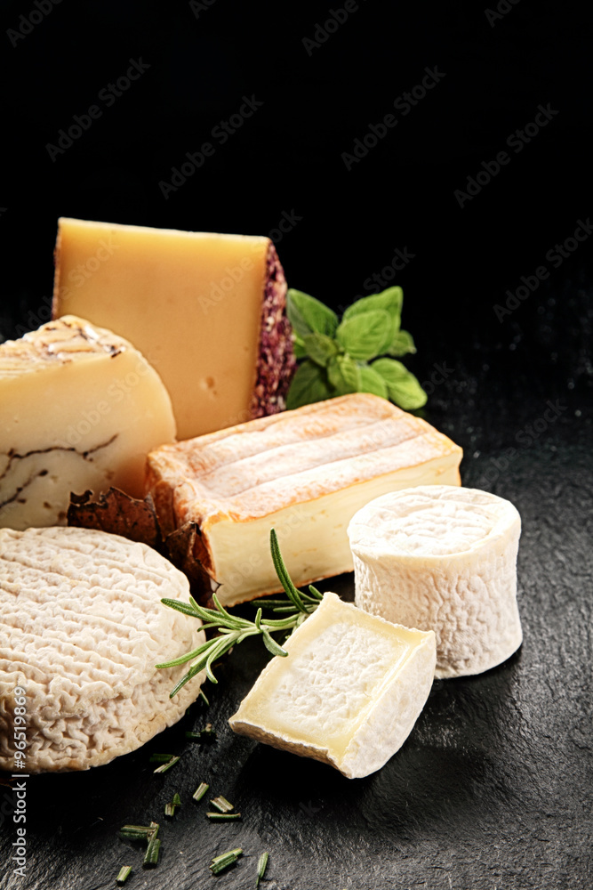 Delicious cheese platter with herbs