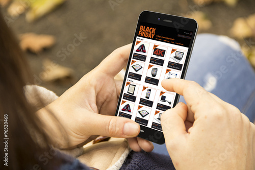 Wallpaper Mural woman with black friday phone in the park Torontodigital.ca