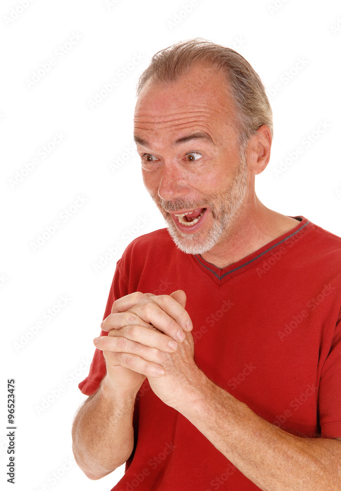 Exited older man hands folded. Exited older man hands folded.