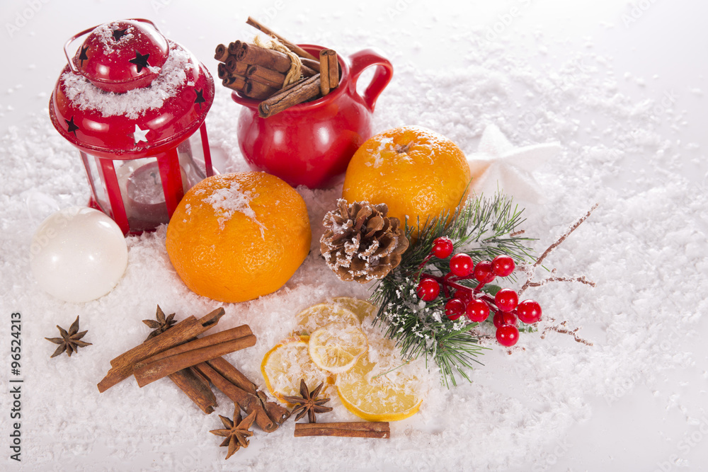 Christmas composition of the candlestick, tangerines, cinnamon, anise and dried lemons - obrazy, fototapety, plakaty 