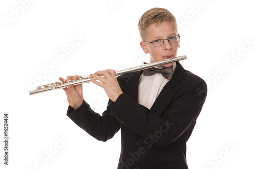 Boy playing the flute on a white background