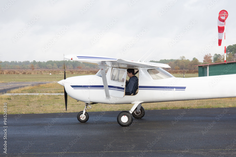Small airplane standing at the runway Small airplane standing at the runway