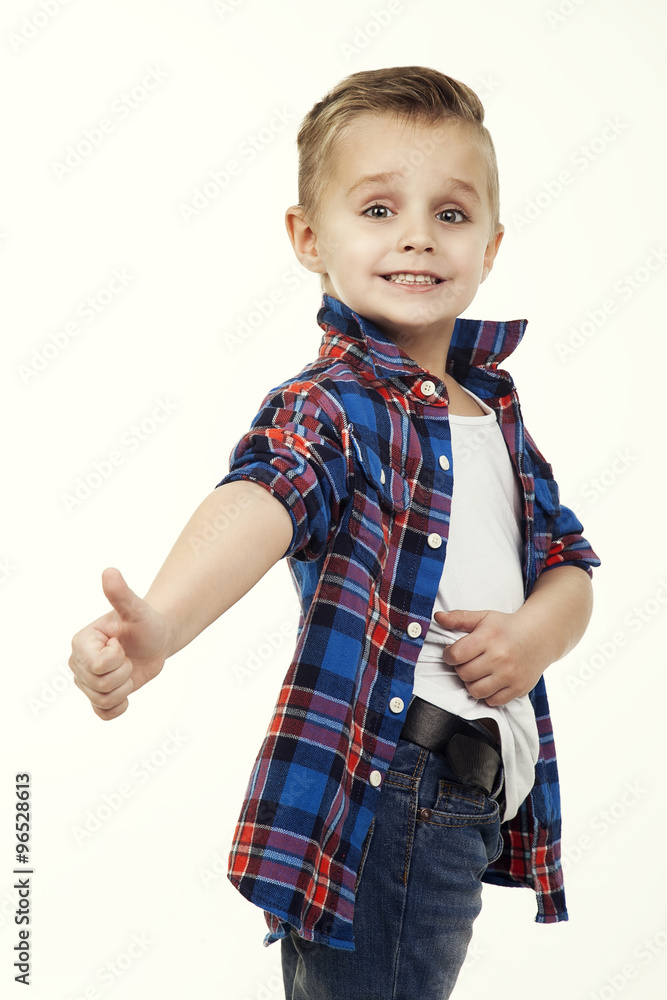 Funny child.fashionable little boy in glasses, jeans, white t-shirt and plaid shirt.stylish kid in sport shoes. fashion children Funny child.fashionable little boy in glasses, jeans, white t-shirt and plaid shirt.stylish kid in sport shoes. fashion children