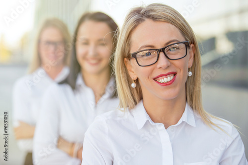Happy business women with glasses © Kaspars Grinvalds