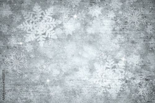 Magical grunge silver colored abstract blurry snowflake shapes and sparkle illustration background. Dreamy winter snowfall copy space greeting card background.  photo