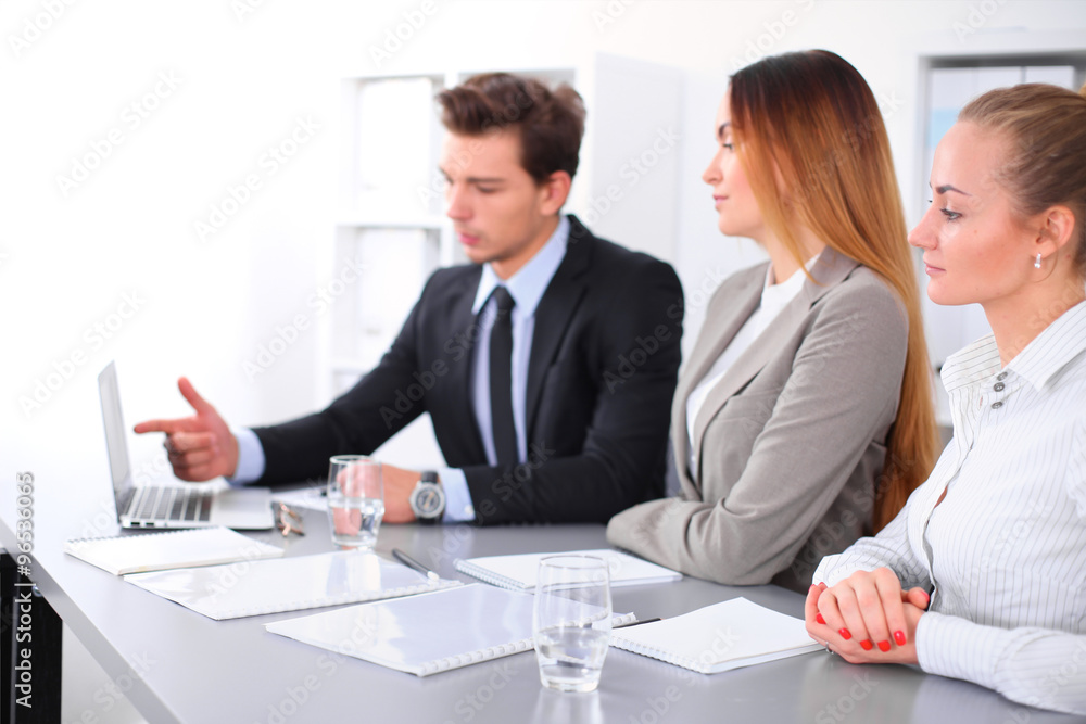 Group of Business people at meeting, focus on blond business woman Group of Business people at meeting, focus on blond business woman