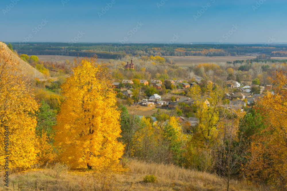 Autumnal landscape with view on Chervlene village from nearest hill, sumskaya oblast, Ukraine